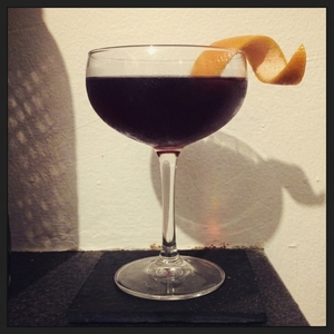 An image of the 2 Cups of Blood cocktail submitted by Toby that contains Mezcal, Suze, Punt e Mes, Xocolatl Mole Bitters and Grapefruit