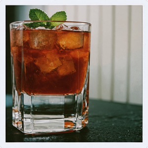 An image of the Blackbeard cocktail submitted by Toby that contains London Dry Gin, Aquavit, Pineapple Juice, Lemon, Agave Syrup, Blackberries and Mint
