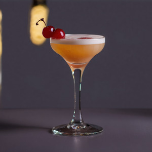 An Instagram of the Champs-Élysées cocktail submitted by Toby that contains Cognac, Lemon, Green Chartreuse, Simple Syrup, Angostura Bitters and Lemon