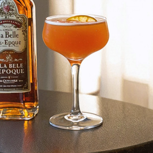 An Instagram of the La Belle Epoque cocktail submitted by n0tquitethere that contains Cognac, Lemon, Yellow Chartreuse, Simple Syrup, Benedictine DOM, Angostura Bitters and Lemon