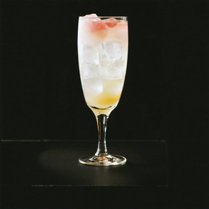 An image of the Pink Sherbet Royale cocktail submitted by Toby that contains Sparkling Wine, Crème de Cassis, Brandy and Blackberries