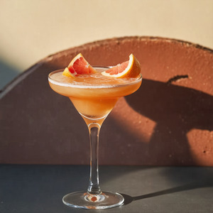 An Instagram of the Pleasant Evening cocktail submitted by Toby that contains Grapefruit, Crème de Cassis, Peach Bitters, Champagne and Grapefruit