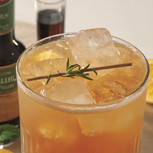 An image of the Queens Park Swizzle cocktail submitted by Toby that contains Agricole Rhum, Lime, Demerara Syrup, Angostura Bitters, Peychauds Bitters, Mint and Mint