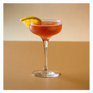 An image of the Saratoga Cocktail cocktail submitted by Toby that contains Whiskey, Brandy, Sweet Vermouth and Lemon