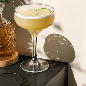 An image of the Tijuana Lady cocktail submitted by Toby that contains Tequila, Licor 43, Lime, Angostura Bitters and Lime