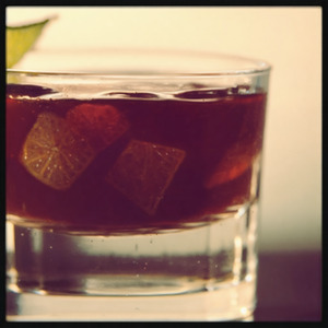 An image of the Virgin's Prayer cocktail submitted by Toby that contains White Rum, Dark Rum, Coffee Liqueur, Lemon, Orange and Lime