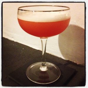 An image of the A. 1 cocktail submitted by n0tquitethere that contains Lemon, Grand Marnier, London Dry Gin, Grenadine and Lemon