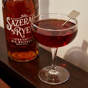 An image of the A Drink With Something In It cocktail submitted by Toby that contains Rye Whiskey, Punt e Mes, Turin Bitters, Bianco Vermouth, Peychauds Bitters, Salt Water and Lemon