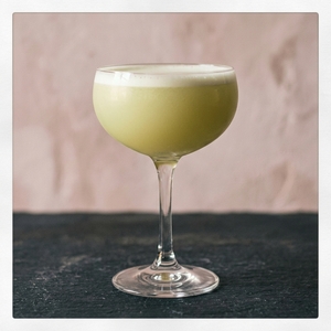An image of the Amaretto Bitter cocktail submitted by Toby that contains Lemon, Amaretto, Smith & Cross, Aperol, Rich Simple Syrup (2:1) and Egg