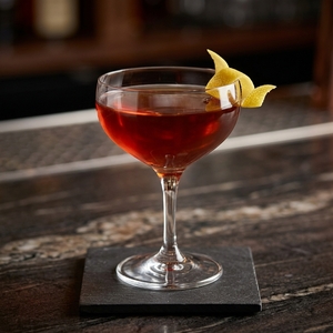 An image of the Anyone's Shadow cocktail submitted by Toby that contains Rye Whiskey, Smith & Cross, Amaro Meletti, Benedictine DOM and Lemon