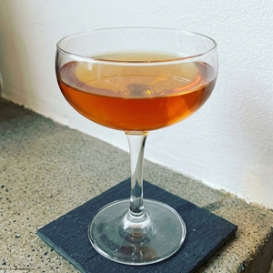 An image of the Arrowhead cocktail submitted by Toby that contains Rye Whiskey, Maraschino Liqueur, Dry Vermouth, Cherry Brandy and Bob's Bitters Abbott's Bitter