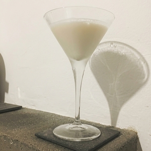 An image of the Bee's Kiss cocktail submitted by Toby that contains White Rum, Cream and Honey Syrup