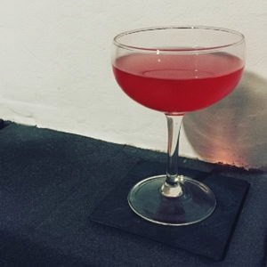An image of the Boomerang Cocktail cocktail submitted by Toby that contains Canadian Whiskey, Dry Vermouth, Swedish Flaggpunsch, Lemon and Angostura Bitters