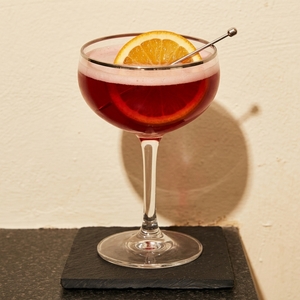 An image of the Bourbon Sour cocktail submitted by Toby that contains Bourbon, Lemon, Gomme Syrup and Orange