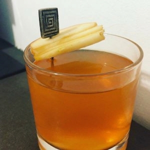 An image of the Bramble & Co. cocktail submitted by Toby that contains Apple Juice, Sweet Vermouth, Plain Vodka, Blackberry Syrup and Apple
