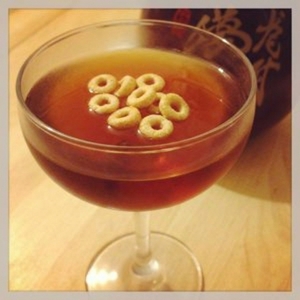 An image of the Brewer's Breakfast cocktail submitted by Toby that contains Sake, Corn Whiskey, Galliano L'authentico and Honey Nut Cherrios