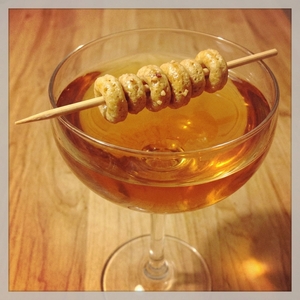 An image of the Brewer's Breakfast cocktail submitted by Toby that contains Sake, Corn Whiskey, Galliano L'authentico and Honey Nut Cherrios