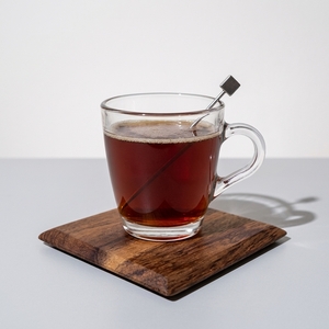 An image of the Café Brûlot cocktail submitted by Toby that contains Orange, Lemon, Curaçao Triple Sec, Brandy, Cinnamon, Cloves and Coffee