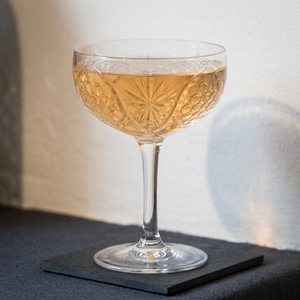 An image of the Camberley cocktail submitted by Toby that contains London Dry Gin, Grand Marnier, Apple Brandy, Orange and Grenadine