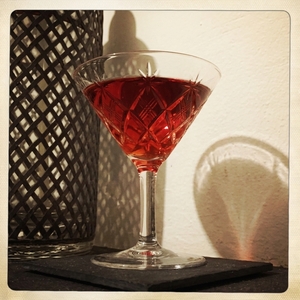An image of the Camparipolitan cocktail submitted by Toby that contains Turin Bitters, Curaçao Triple Sec, Lime, Cranberry Juice and Salt
