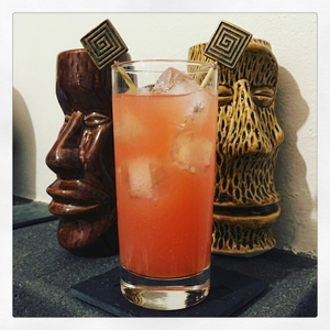 An image of the Catwalk Collins cocktail submitted by Toby that contains Plain Vodka, Grapefruit, Orgeat Syrup, Lemon, Blue Curaçao and Soda Water