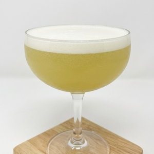 An image of the Chelsea Sidecar cocktail submitted by Toby that contains London Dry Gin, Curaçao Triple Sec, Lemon and Lemon