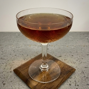 An image of the Cherry Blossom Cocktail cocktail submitted by Toby that contains Cherry Brandy, Brandy, Curaçao Triple Sec, Lemon and Grenadine