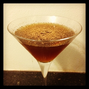 An image of the Chocolate Punch cocktail submitted by Toby that contains Cognac, LBV Port, Crème de Cacao Dark, Simple Syrup, Cream and Nutmeg