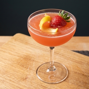 An image of the Club Cocktail cocktail submitted by Toby that contains Brandy, Maraschino Liqueur, Pineapple Juice, Peychauds Bitters, Lemon and Strawberries