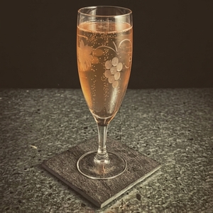 An image of the D'Artagnan cocktail submitted by Toby that contains Armagnac, Grand Marnier, Orange, Simple Syrup, Champagne and Orange