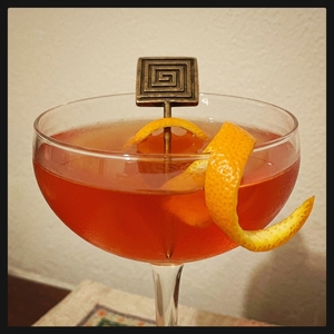 An image of the Deadpan Fix cocktail submitted by Toby that contains Rye Whiskey, Turin Bitters, Grand Marnier, Grapefruit, Lemon, Ginger Syrup and Orange