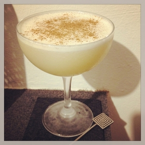 An image of the Dulce de Leche cocktail submitted by Toby that contains Anejo Tequila, Pedro Ximénez Sherry, Cream, Egg and Cinnamon