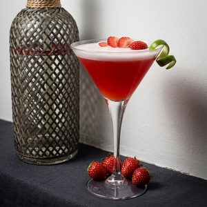 An image of the Fair Lady cocktail submitted by Toby that contains London Dry Gin, Orange, Lime, Egg, Crème de Fraise, Strawberries and Lime