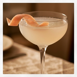 An image of the Fatigue cocktail submitted by Toby that contains Tennessee Whiskey, Maraschino Liqueur, Angostura Bitters and Grapefruit