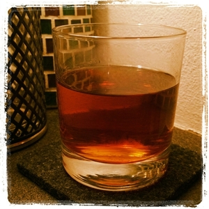 An image of the Fire in the Orchard cocktail submitted by Toby that contains Apple Brandy, Mezcal, Pear Brandy, Cocchi Americano, Lemon and Agave Syrup