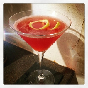 An image of the Fishnets& Fangs cocktail submitted by Toby that contains Peychauds Bitters, Lime, Drambuie, Raspberry Syrup, Mezcal and Lemon
