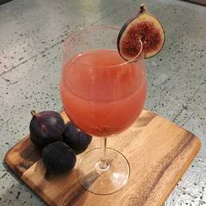 An image of the French 95 cocktail submitted by Toby that contains Bourbon, Simple Syrup, Lemon, Orange and Champagne