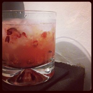 An image of the Ginger Smash, Winter cocktail submitted by n0tquitethere that contains Fresh Ginger, Cranberries, Caster Sugar, London Dry Gin, Apple Schnapps and Lemon