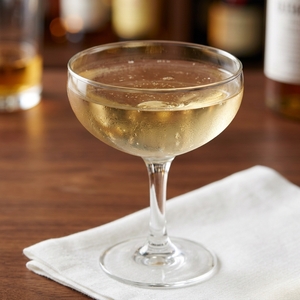 An image of the Gypsy Eyes cocktail submitted by Toby that contains Green Chartreuse, London Dry Gin, Aperol, Lime, Grapefruit and Simple Syrup