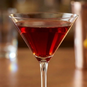 An image of the Hanky Panky cocktail submitted by Toby that contains London Dry Gin, Sweet Vermouth, Fernet Branca and Orange