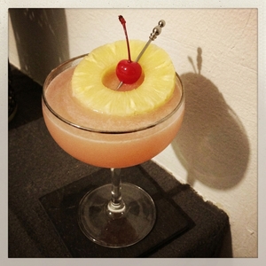 An image of the Have a Heart Cocktail cocktail submitted by Toby that contains London Dry Gin, Swedish Flaggpunsch, Lime, Grenadine, Pineapple and Cocktail Cherry