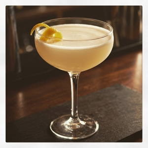 An image of the Hell Diver cocktail submitted by Toby that contains London Dry Gin, Dubonnet Rouge, Crème de Cacao Blanc, Absinthe and Lemon