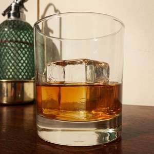 An image of the Hotel D'Alsace cocktail submitted by Toby that contains Irish Whiskey, Curaçao Triple Sec, Benedictine DOM and Rosemary