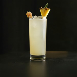An image of the Jamaica Mule cocktail submitted by Toby that contains White Rum, Dark Rum, Gold Rum, Falernum, Lime, Ginger Beer, Pineapple and Crystallised Ginger