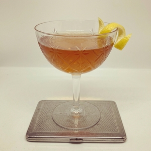 An image of the Japanese cocktail submitted by Toby that contains Brandy, Orgeat Syrup, Bokers Bitters and Lemon