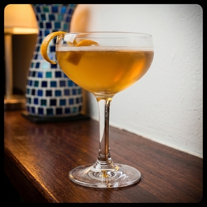 An image of the Jockey cocktail submitted by Toby that contains Bourbon, Kirschwasser, Drambuie, Orange and Grenadine