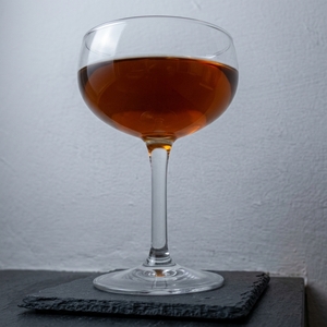 An image of the Johnnie Mack cocktail submitted by Toby that contains Sloe Gin, Curaçao Triple Sec, Pastis and Lemon