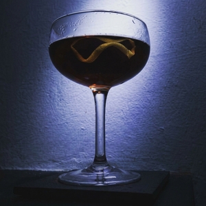 An image of the Johnnie Mack cocktail submitted by Toby that contains Sloe Gin, Curaçao Triple Sec, Pastis and Lemon