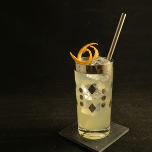An image of the Kingston Club cocktail submitted by Toby that contains Drambuie, Pineapple Juice, Lime, Fernet Branca, Angostura Bitters, Soda Water and Orange