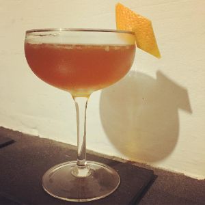 An image of the Kojo Cocktail cocktail submitted by n0tquitethere that contains London Dry Gin, Olorosso Sherry, Falernum, Lemon, Simple Syrup, The Bitter Truth Jerry Thomas' Own Decanter Bitter and Grapefruit